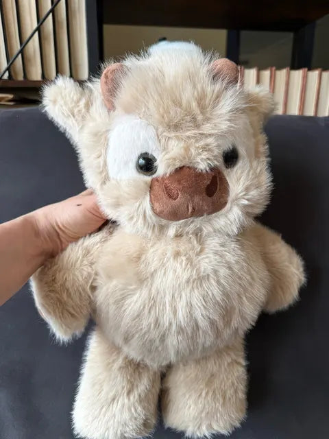 Peluche vache Highland reçue par Katia B.
